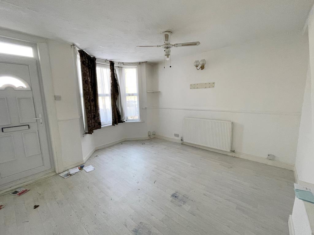 Lot: 1 - THREE-BEDROOM MID-TERRACE HOUSE - Living room with bay window